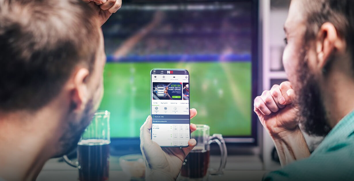 ragazzi che scommettono online su mobile